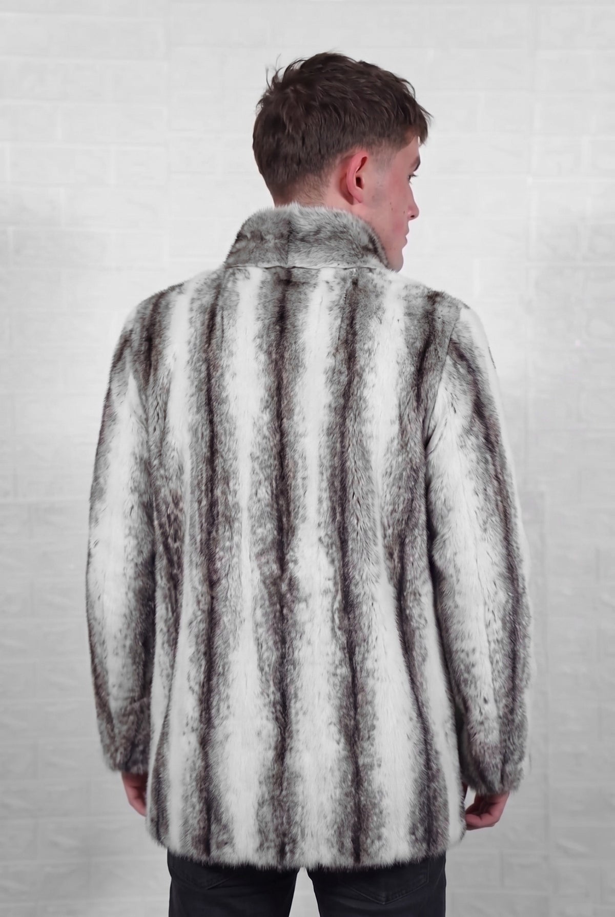 mink fur jacket men black cross back view from the side showing the full skin pelt lines and satin-lined mid length cut — TatiFurs