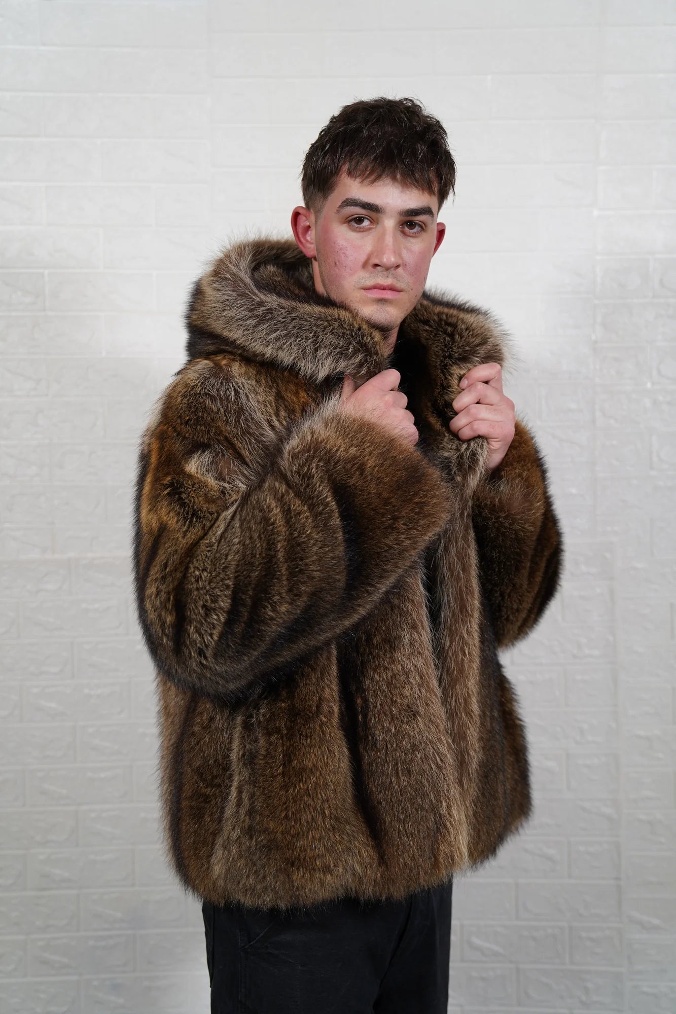 Raccoon fur jacket men natural brown close-up texture showing full skin raccoon long pile depth and warm natural brown tonal variation — Greek craftsmanship, TatiFurs
