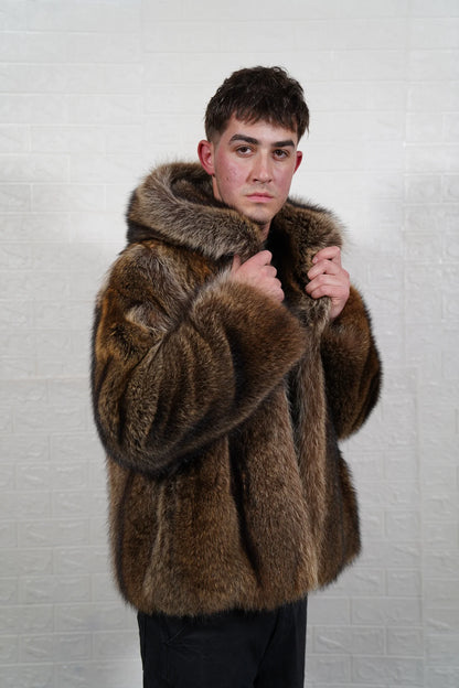 Raccoon fur jacket men natural brown close-up texture showing full skin raccoon long pile depth and warm natural brown tonal variation — Greek craftsmanship, TatiFurs
