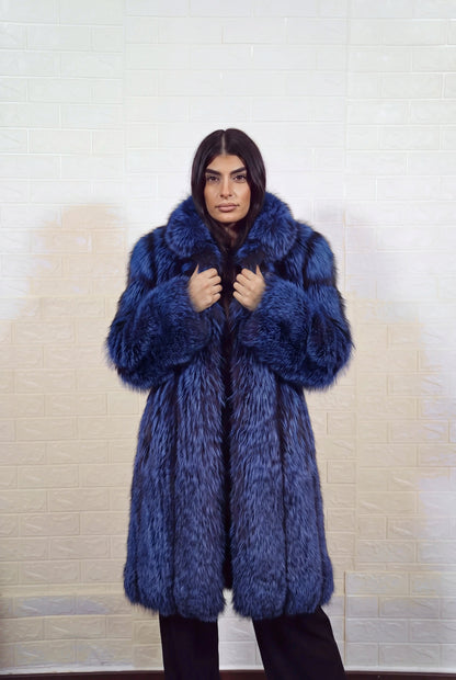 fox fur coat long blue black front view with both hands on the fur collar showing electric blue over jet black fox fur — TatiFurs