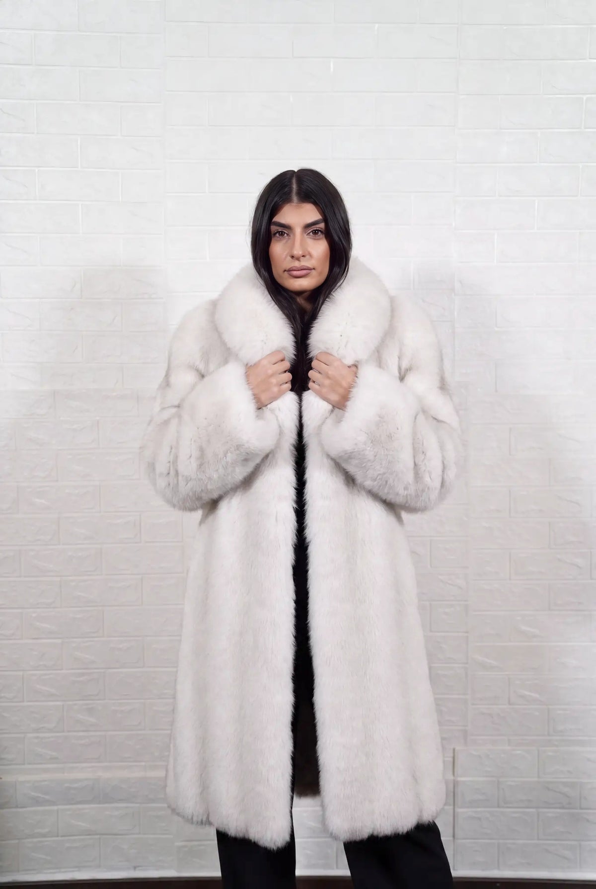 fox fur coat long blue natural front view with both hands on the fur collar showing natural blue fox, ivory-white underfur with a soft blue-grey veil at the tips fox fur — TatiFurs