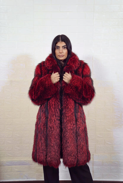 fox fur coat long red black front view with both hands on the fur collar showing deep crimson over jet black fox fur — TatiFurs