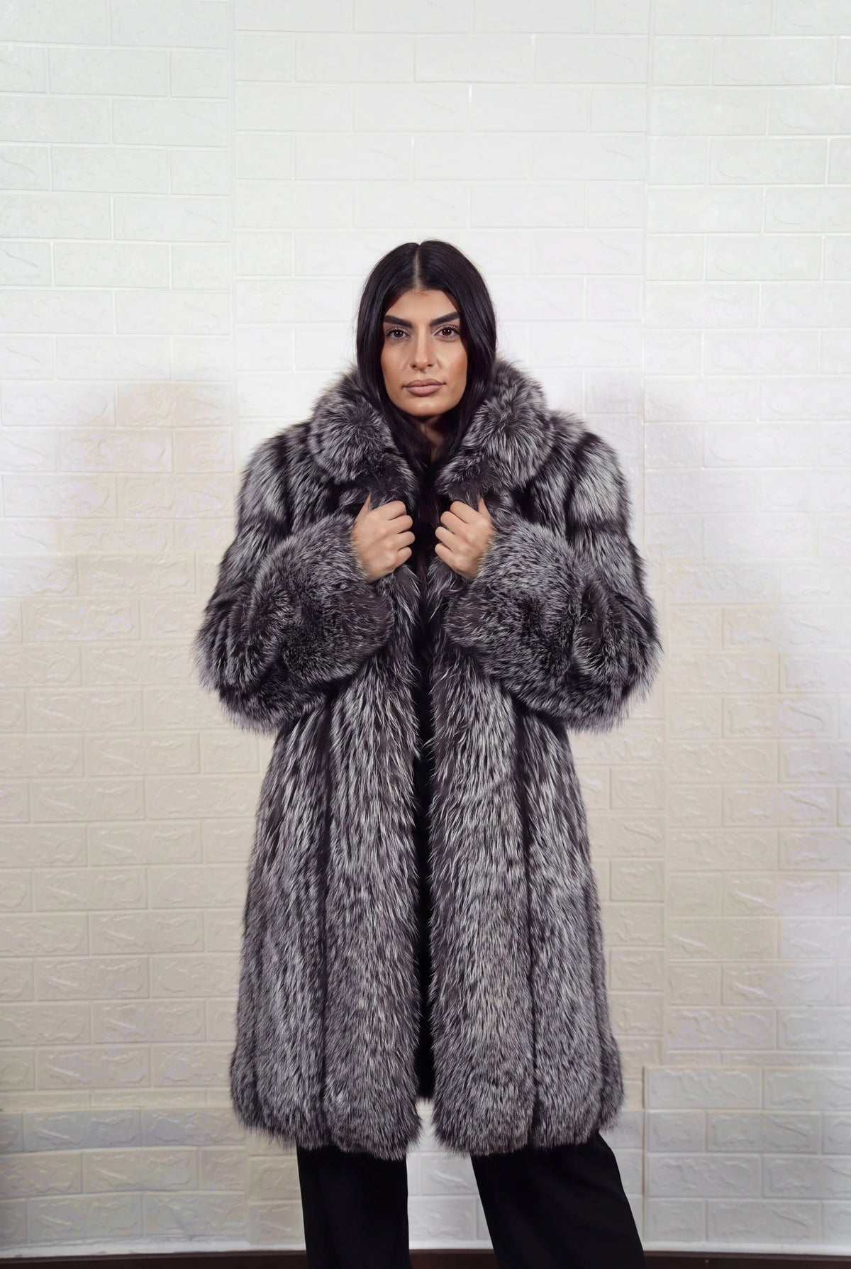 fox fur coat long silver natural front view with both hands on the fur collar showing natural silver fox, black base with silver-white tips fox fur — TatiFurs