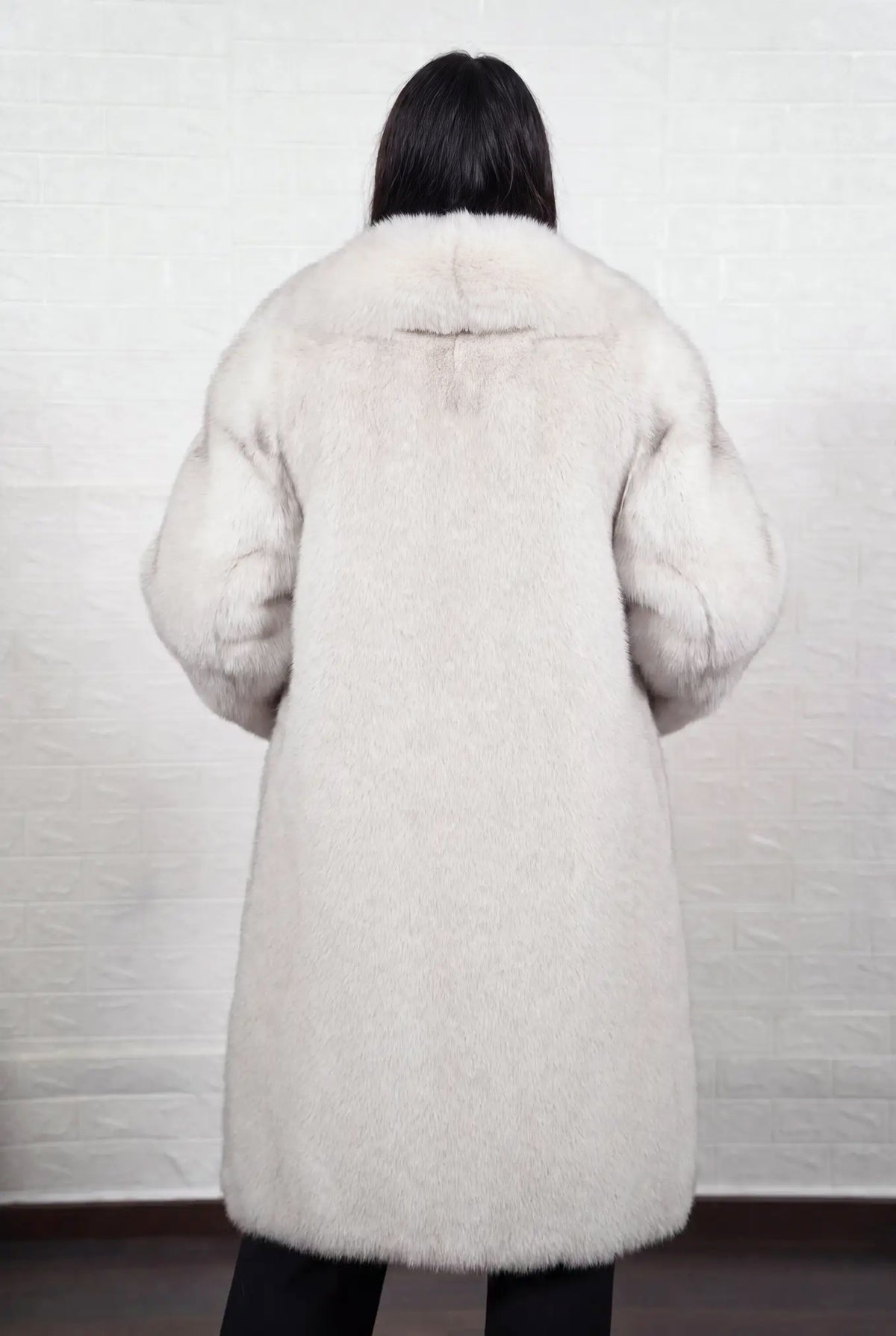 fox fur coat long blue natural shown from the back displaying full long silhouette and consistent natural blue fox, ivory-white underfur with a soft blue-grey veil at the tips pile — Greek craftsmanship, TatiFurs