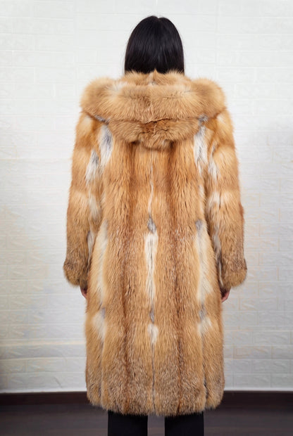 fox fur coat long golden natural shown from the back displaying full long silhouette, fur hood and consistent natural golden fox, warm amber-gold with cream and pale silver highlights pile — Greek craftsmanship, TatiFurs
