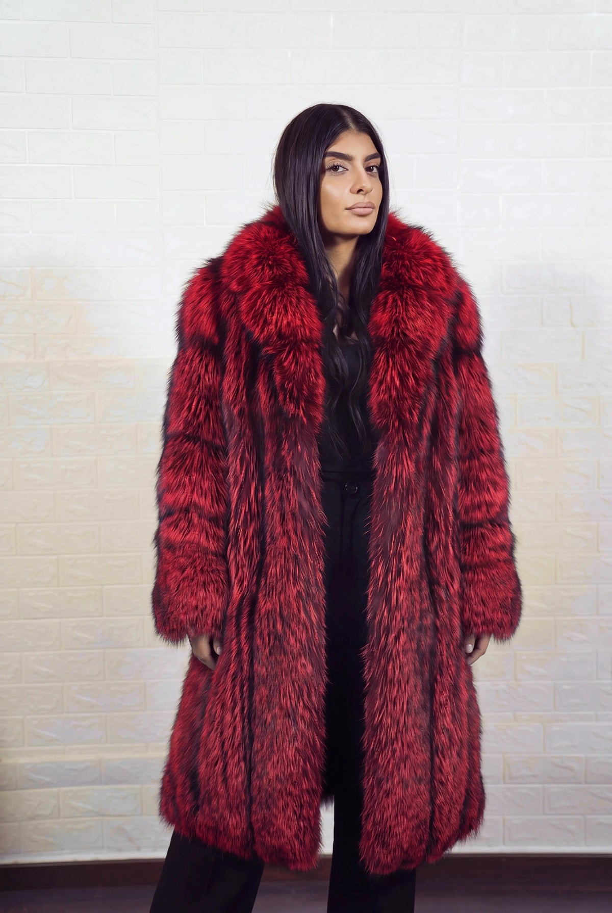fox fur coat long red black side view with the fur collar turned up showing long coat and deep crimson over jet black fox fur — Greek craftsmanship, TatiFurs