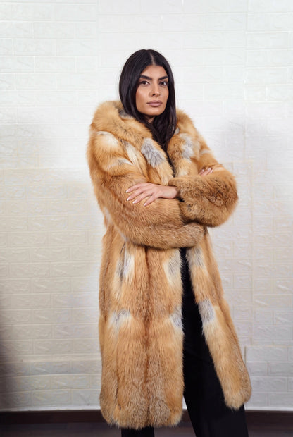 fox fur coat long golden natural front view with arms crossed displaying long coat and natural golden fox, warm amber-gold with cream and pale silver highlights fox fur pile depth — TatiFurs