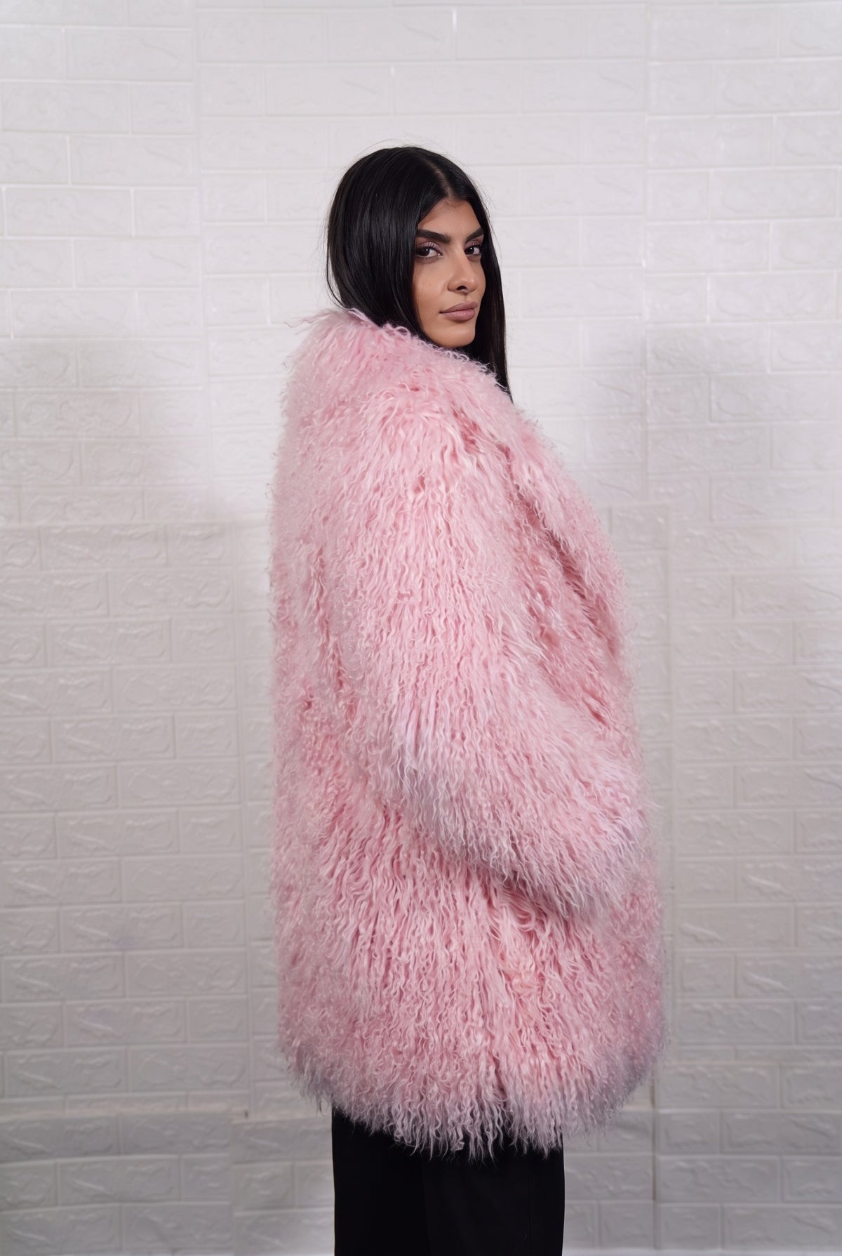 Mongolian coat pink women three-quarter back view displaying voluminous soft blush pink Mongolian wool sheepskin — Greek craftsmanship, TatiFurs