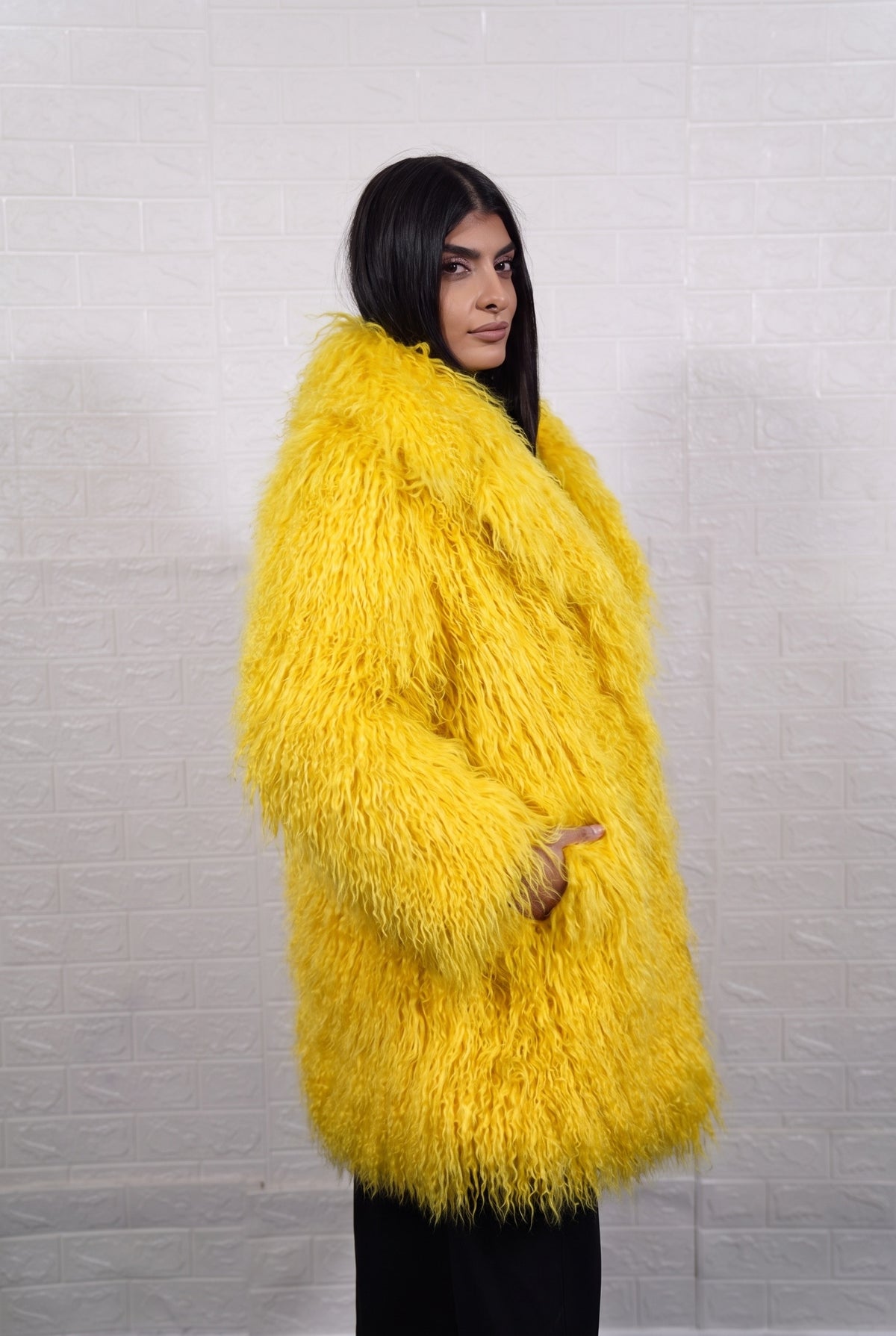 Mongolian coat yellow women three-quarter back view displaying voluminous bright sunshine yellow Mongolian wool sheepskin — Greek craftsmanship, TatiFurs