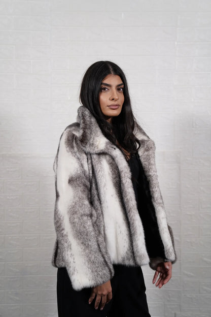 Mink fur jacket cross button closure detail showing clean front line on black white cross cut mink jacket — Greek craftsmanship, TatiFurs
