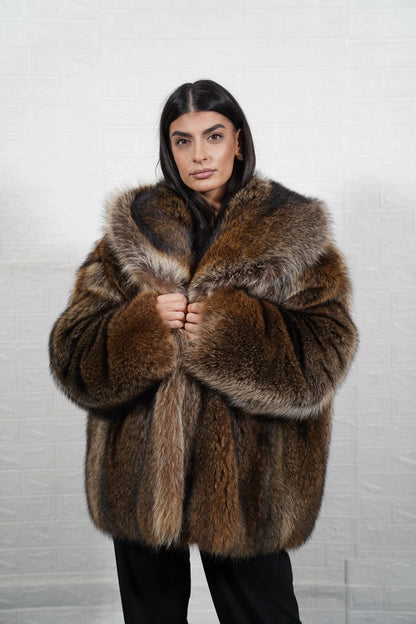 Raccoon fur jacket natural brown close-up texture showing full skin raccoon long pile depth and warm natural brown tonal variation — Greek craftsmanship, TatiFurs
