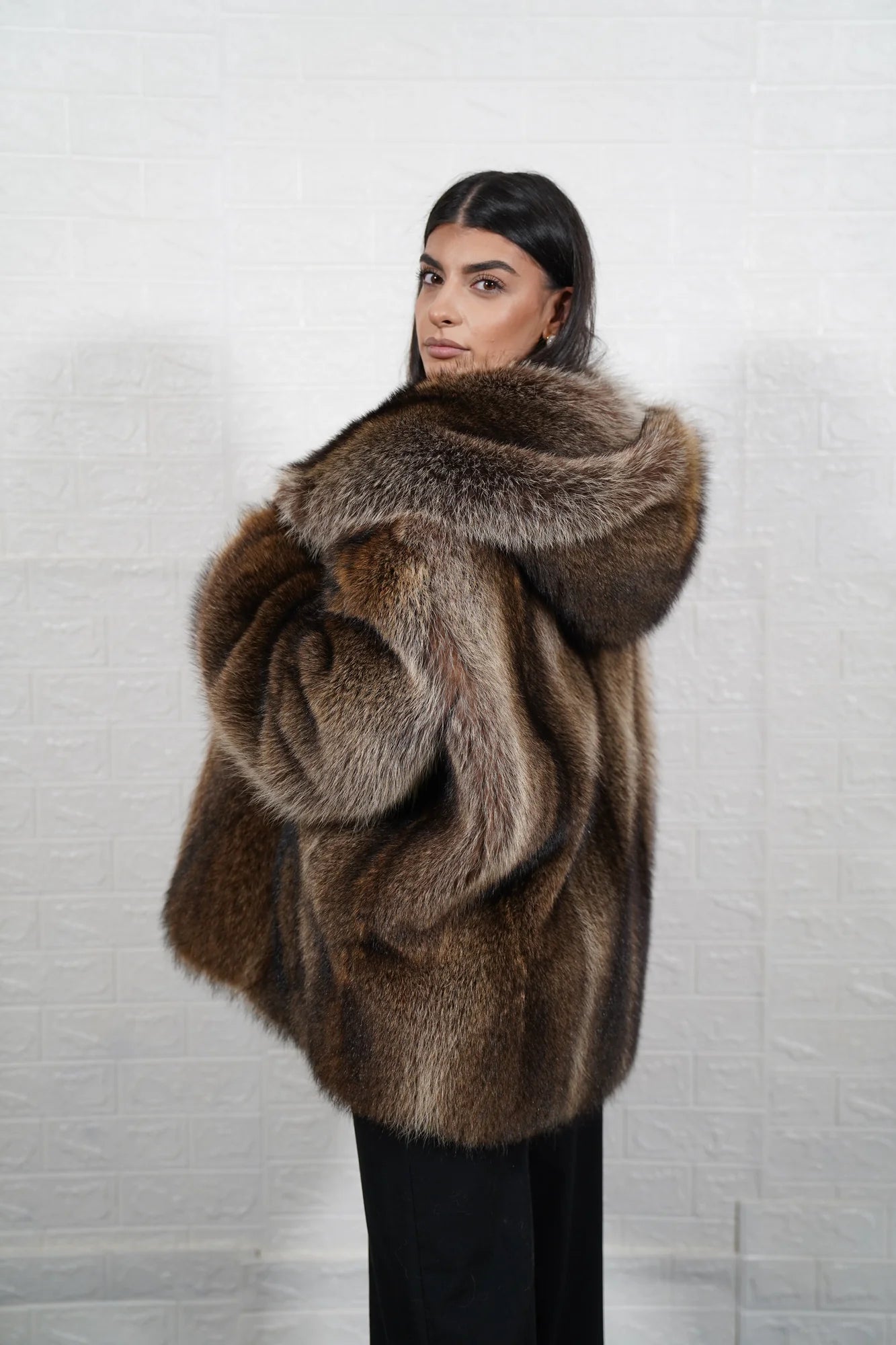 Raccoon fur jacket natural brown women shown full length from front displaying hooded silhouette and button closure in full skin natural raccoon — Greek craftsmanship, TatiFurs
