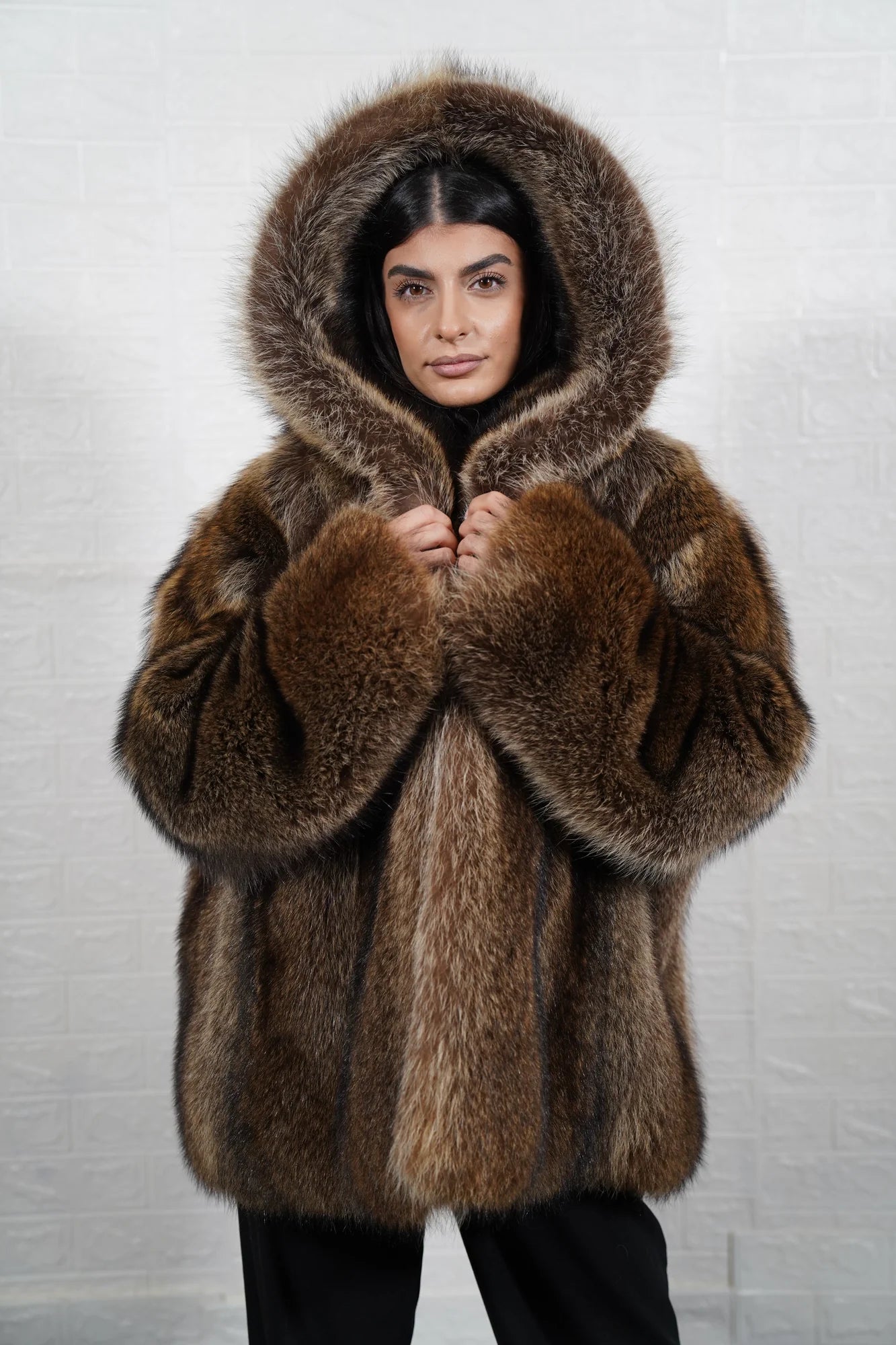 Raccoon fur jacket natural brown displaying full skin warm brown raccoon and below hip hooded silhouette — Greek craftsmanship, TatiFurs
