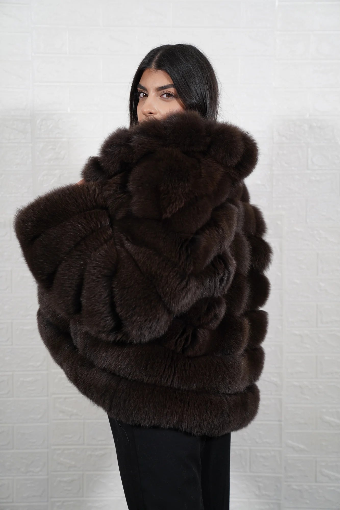 Fox fur jacket brown close-up texture showing full skin brown fox long pile and horizontal rabbit fur trim strip construction between fox rows — Greek craftsmanship, TatiFurs
