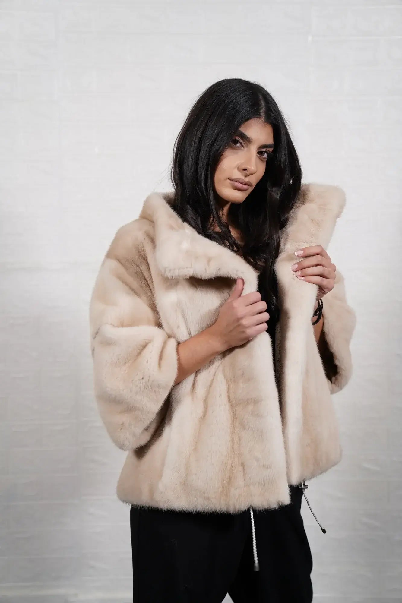Mink fur jacket pastel ivory shown from the back displaying full hip level silhouette and consistent flat ivory solid pattern full skin mink — Greek craftsmanship, TatiFurs
