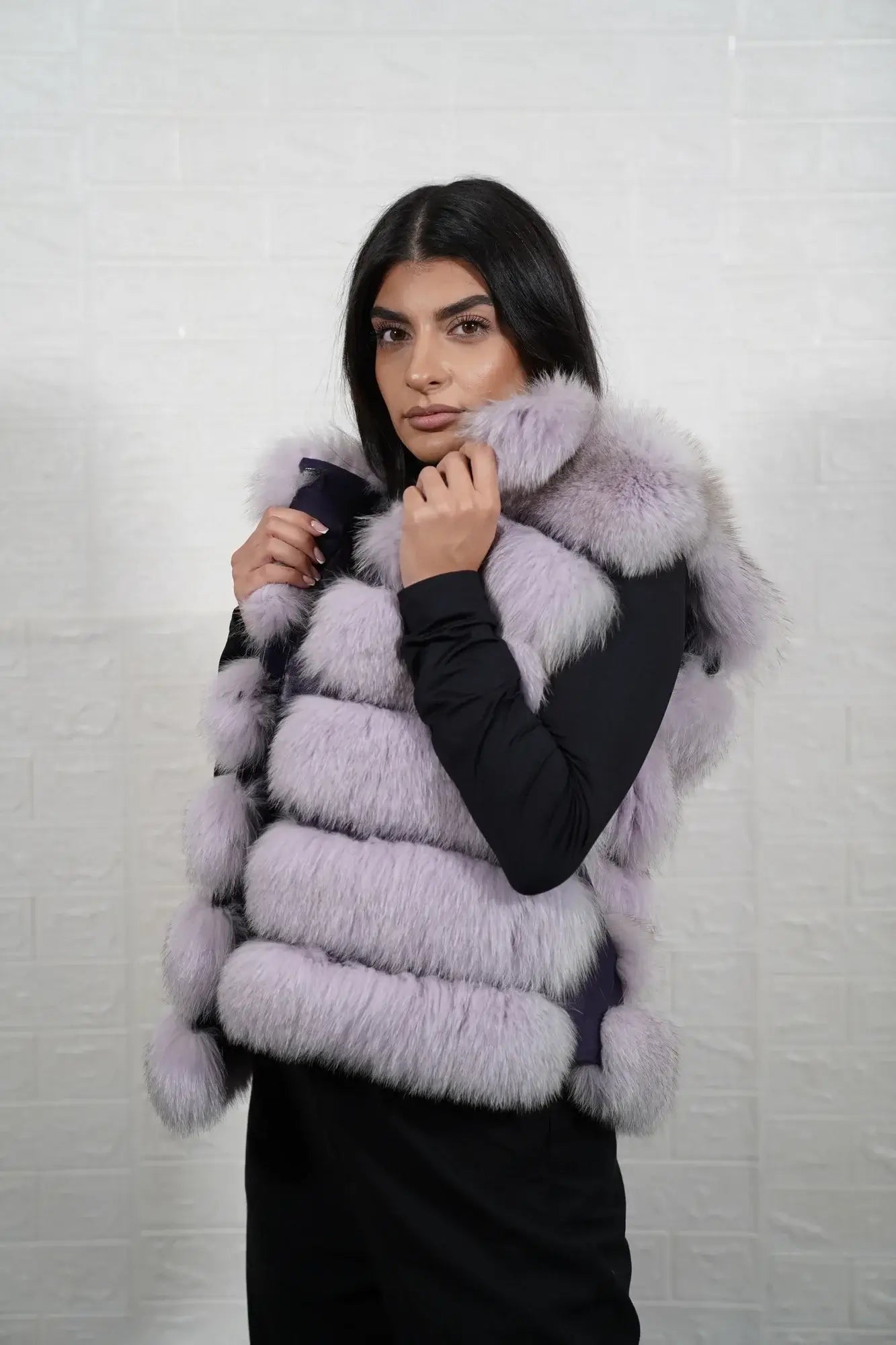 Fox fur vest purple close-up texture showing full skin purple fox long pile and horizontal leather strip construction between fur rows — Greek craftsmanship, TatiFurs
