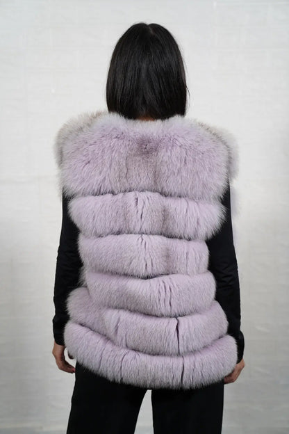 Fox fur vest purple shown from the back displaying full hip level silhouette and horizontal leather strip construction across purple fox rows — Greek craftsmanship, TatiFurs
