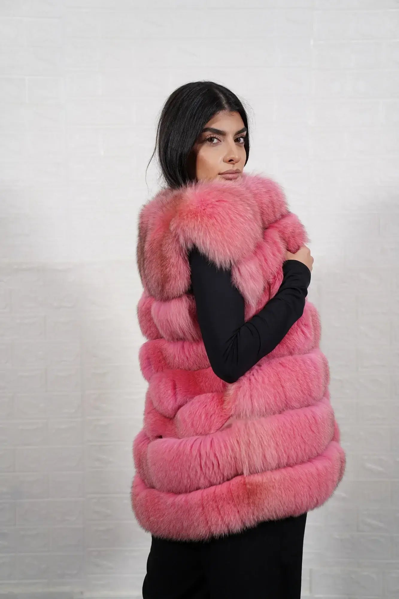 Fox fur vest pink displaying full skin pink fox horizontal rows with clean leather strips and hip level collared silhouette — Greek craftsmanship, TatiFurs

