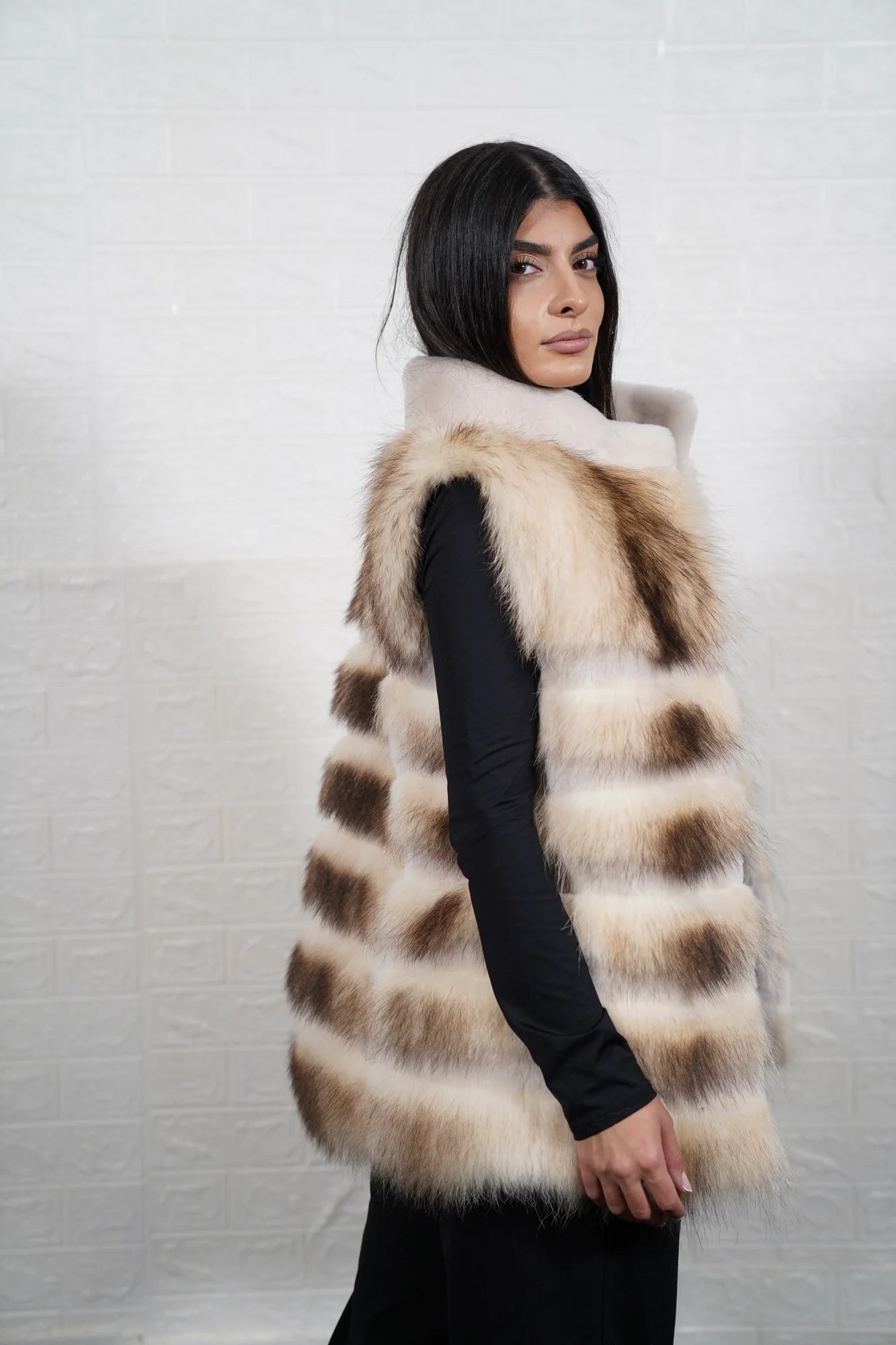 Finn raccoon vest sheepskin lines close-up texture showing Finnish raccoon long pile depth and off white sheepskin strip horizontal construction between fur rows — Greek craftsmanship, TatiFurs
