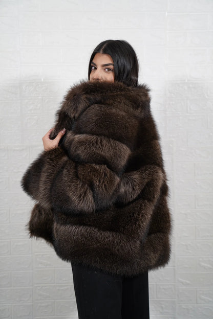 Raccoon fur jacket brown close-up texture showing natural brown raccoon pile depth and warm tonal variation across colour matched panels — Greek craftsmanship, TatiFurs
