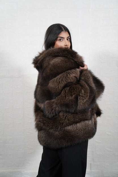 Raccoon fur jacket brown shown from the back displaying full below hip silhouette and consistent natural brown raccoon panel surface — Greek craftsmanship, TatiFurs
