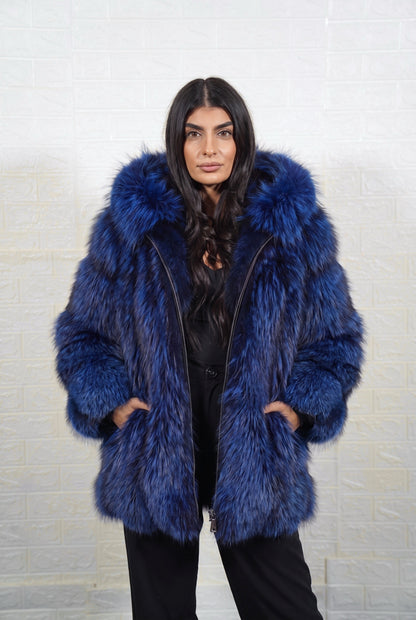 fox fur jacket blue black full skin mid length — front view, hood down, hands in pockets, TatiFurs