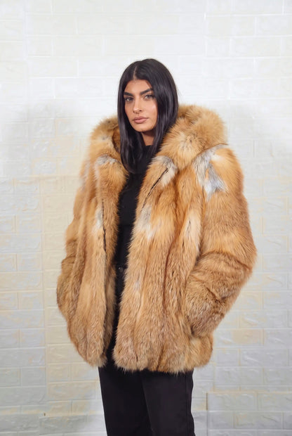fox fur jacket golden natural three-quarter view displaying mid length jacket and natural golden fox, warm amber-gold with cream and pale silver highlights fox fur pile depth — TatiFurs