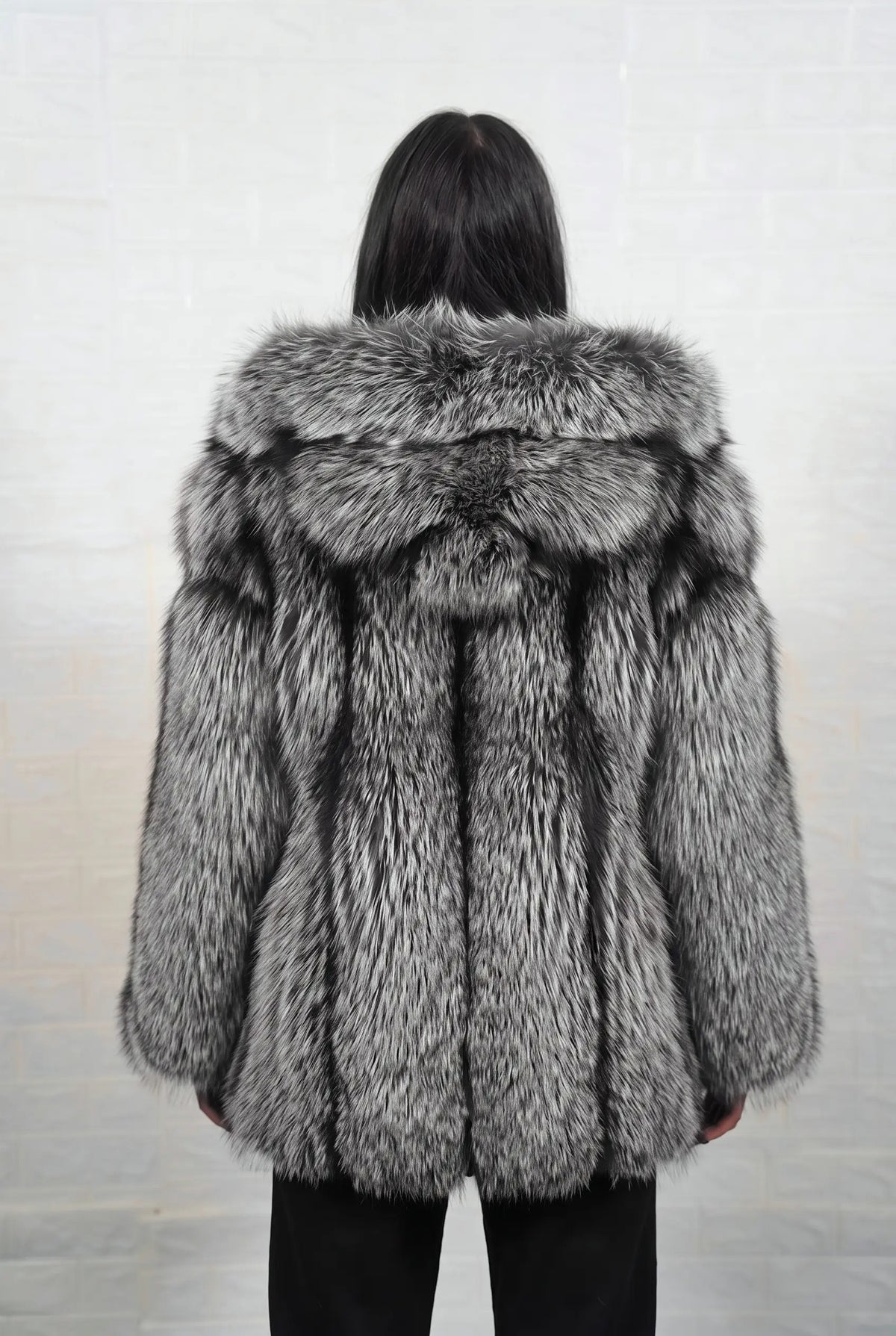 fox fur jacket silver natural shown from the back displaying full mid length silhouette and consistent natural silver fox, black base with silver-white tips pile — Greek craftsmanship, TatiFurs