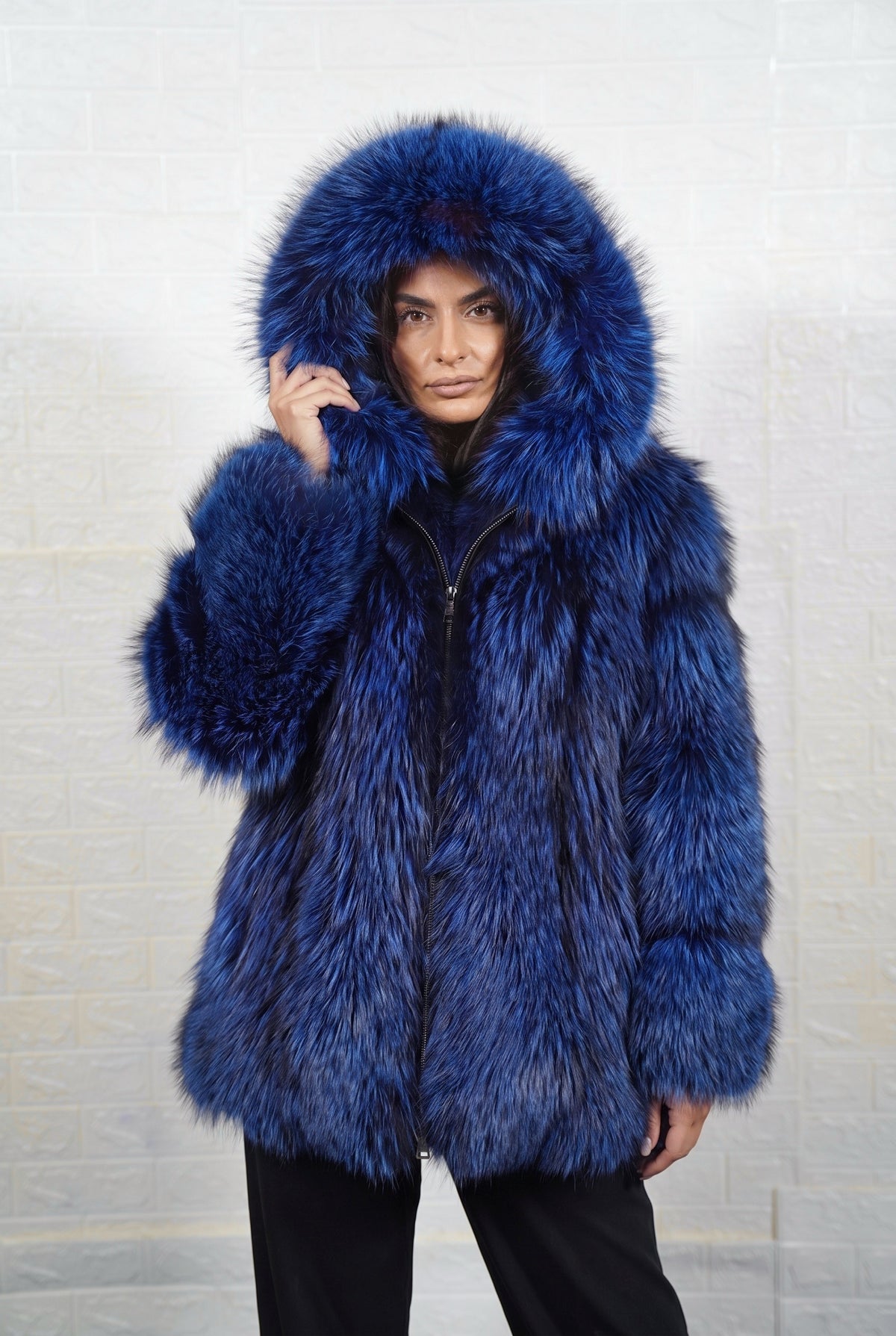 fox fur jacket blue black worn with the fur hood up framing the face in electric blue over jet black fox fur — TatiFurs
