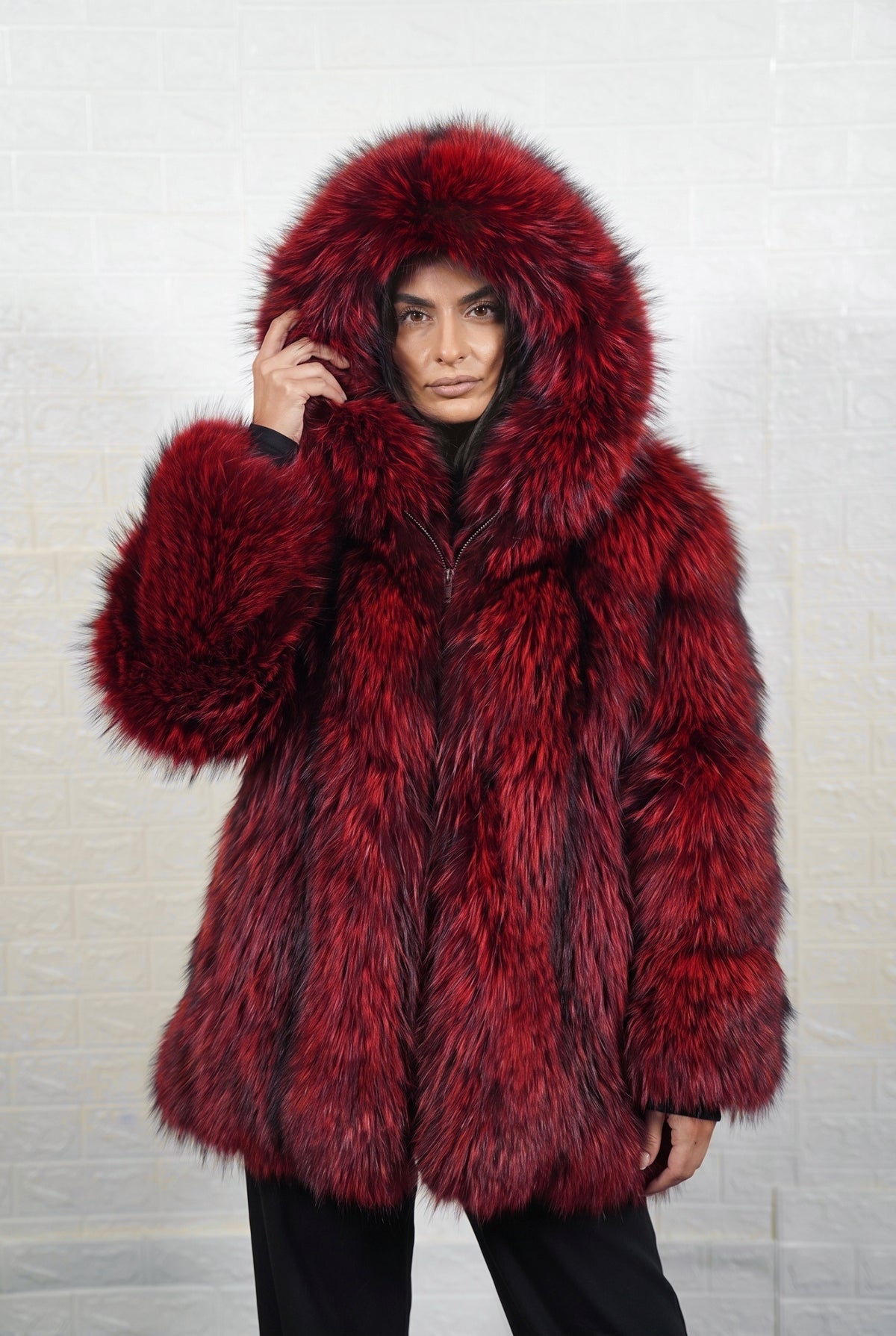 fox fur jacket red black worn with the fur hood up framing the face in deep crimson over jet black fox fur — TatiFurs