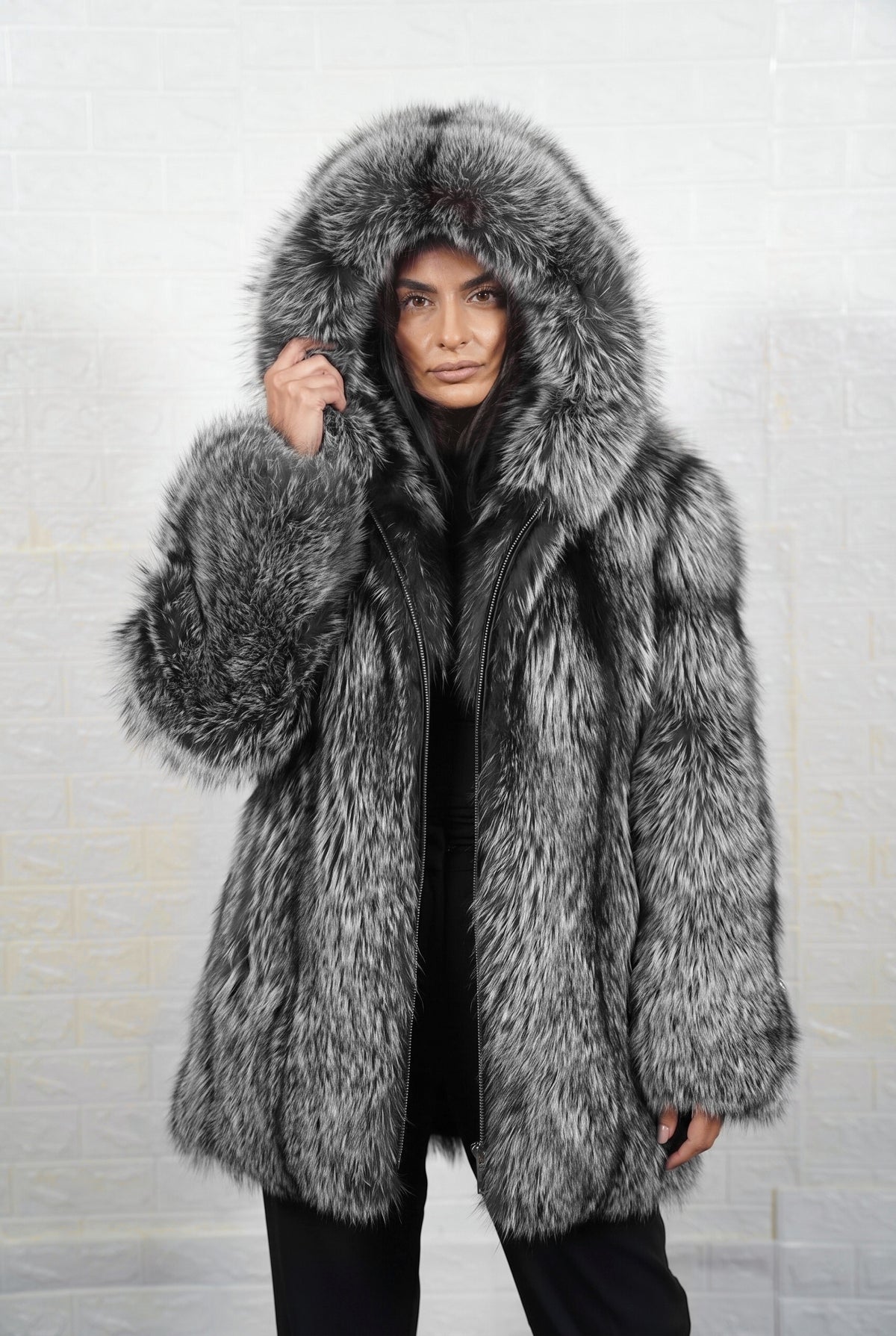 fox fur jacket silver natural worn with the fur hood up framing the face in natural silver fox, black base with silver-white tips fox fur — TatiFurs