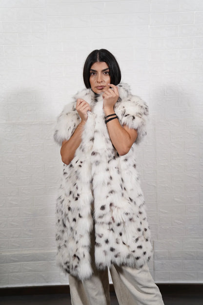 Fox fur vest white dalmatian short sleeve detail showing sleeve construction in natural black spotted white dalmatian fox — Greek craftsmanship, TatiFurs

