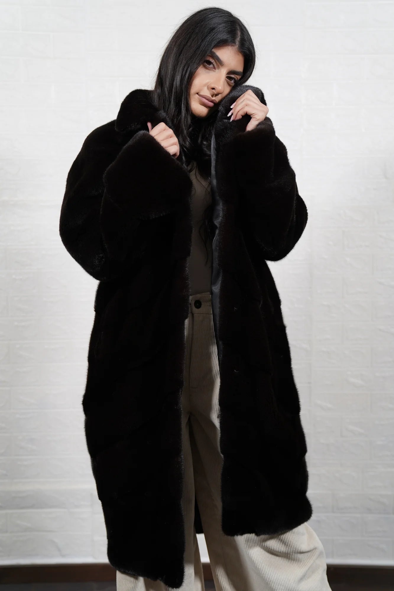 mink fur coat dark brown — horizontal full skin mink rows, close-up surface detail — Greek craftsmanship, TatiFurs
