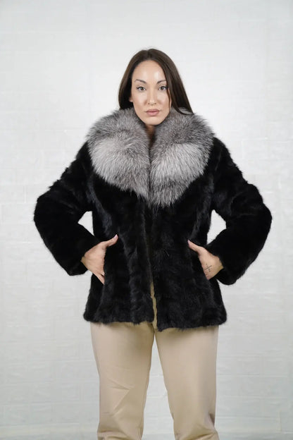Mink fur jacket black fox collar shown from the side displaying hip level silhouette and natural frost fox collar drape over black mink body — Greek craftsmanship, TatiFurs
