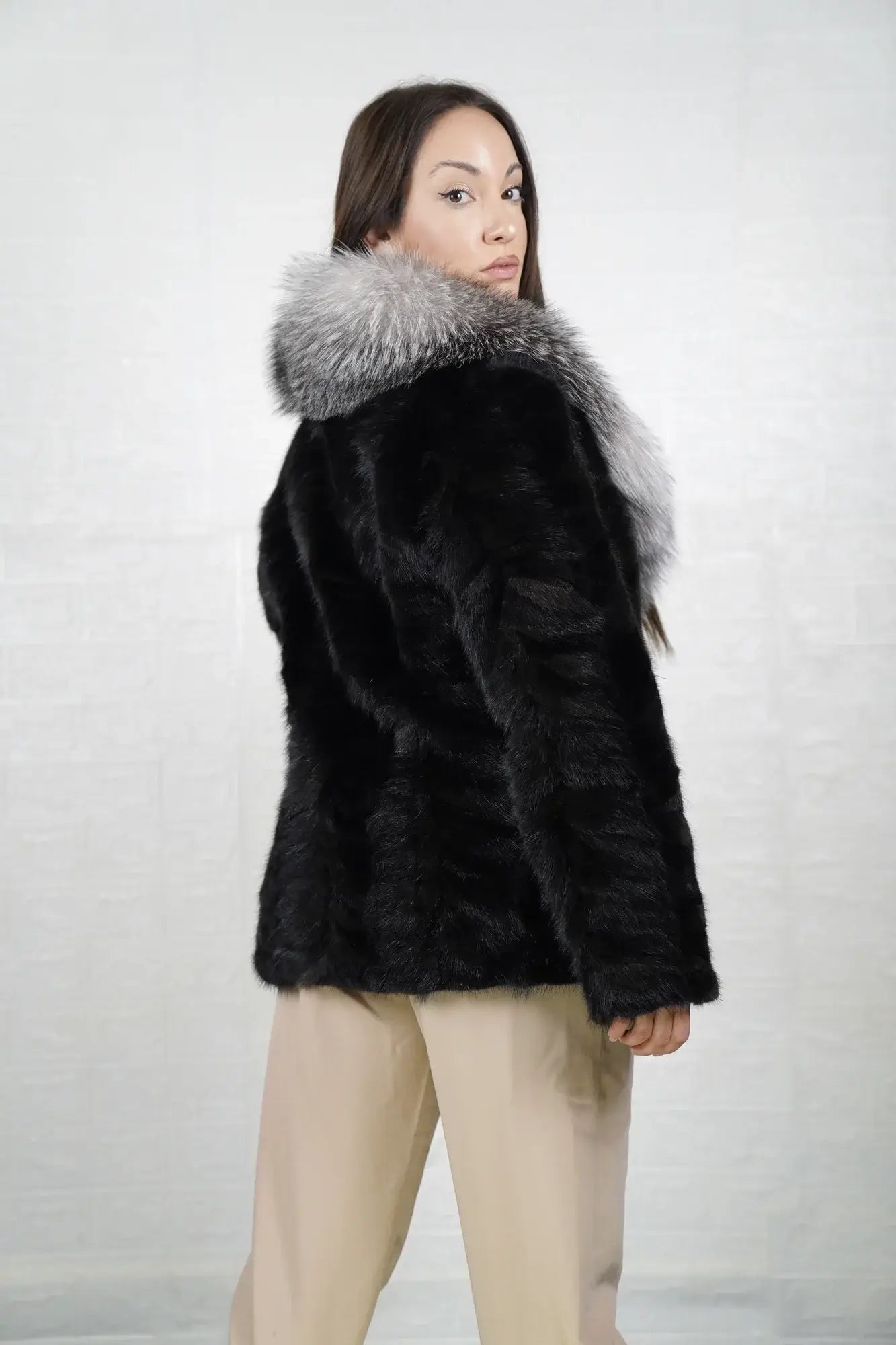 Mink fur jacket black fox collar close-up texture showing colour matched black mink patchwork plate surface — Greek craftsmanship, TatiFurs
