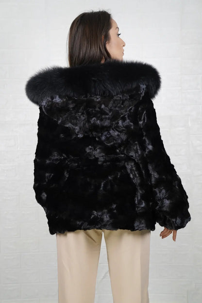Mink fur cape black fox trim hood shown from the back displaying full hip level silhouette and uniform black patchwork mink surface — Greek craftsmanship, TatiFurs

