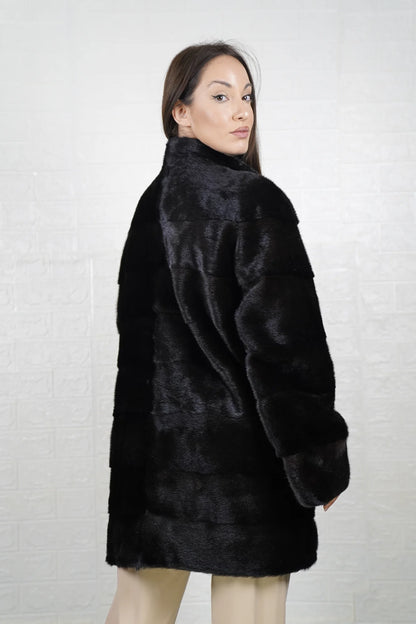 Mink fur coat black collar close-up showing precise pelt matching between collar and shoulder skins in deep black mink — Greek craftsmanship, TatiFurs
