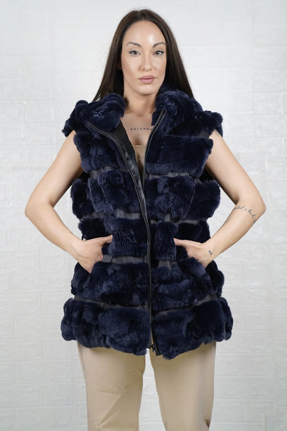 Rex rabbit fur vest blue close-up texture showing dense velvety blue rex rabbit pile and horizontal leather strip construction between fur rows — Greek craftsmanship, TatiFurs
