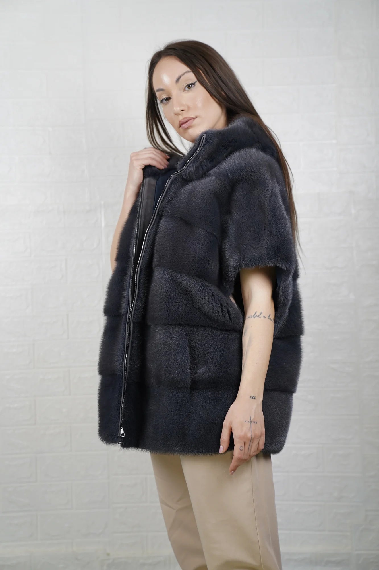 Mink fur cape gray close-up texture showing skin on skin vertical pelt flow and cool dimensional gray mink depth
