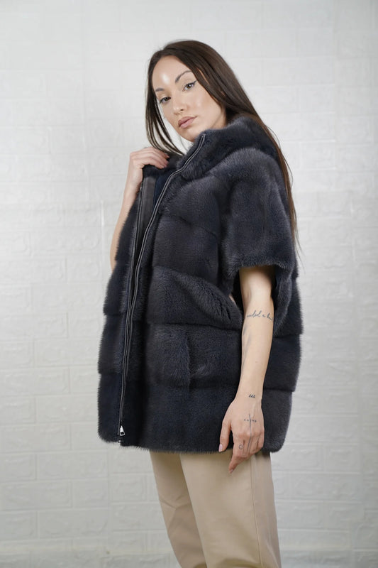 Mink fur cape gray close-up texture showing skin on skin vertical pelt flow and cool dimensional gray mink depth
