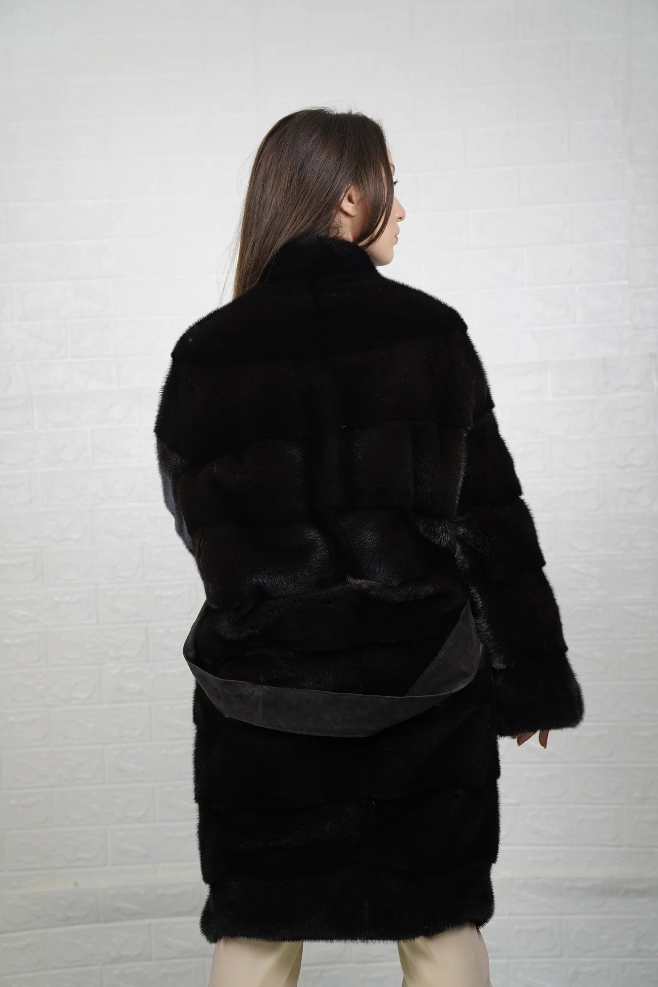 Mink fur coat dark brown collared long with belt shown from the back displaying full knee length silhouette and deep consistent dark brown skin on skin mink flow — Greek craftsmanship, TatiFurs

