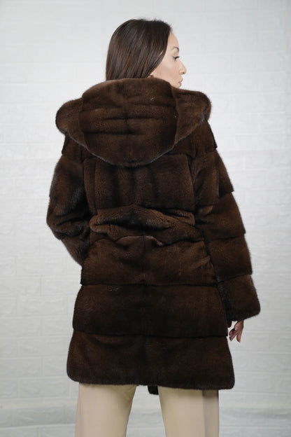 Mink fur coat brown with hood shown from the back displaying full above the knee silhouette and deep consistent brown skin on skin mink flow — Greek craftsmanship, TatiFurs
