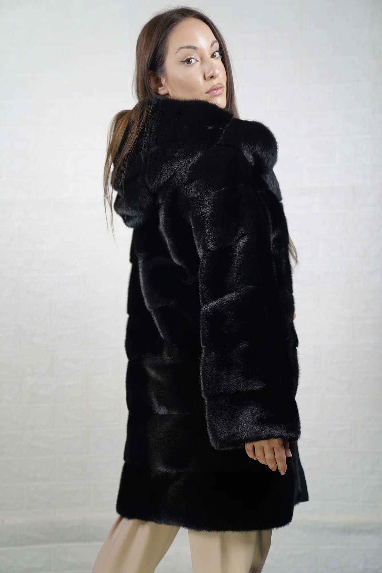 Mink fur coat black with hood displayed showing deep consistent black tone and full above the knee silhouette — Greek craftsmanship, TatiFurs
