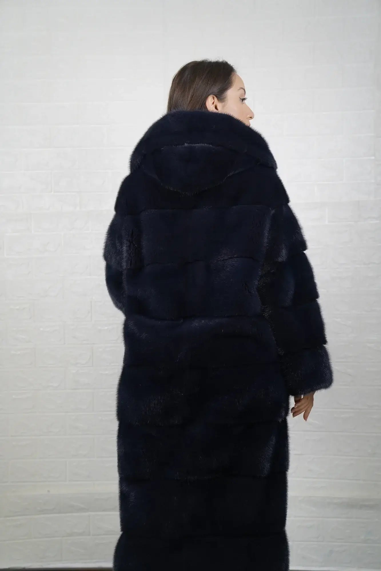 Mink fur overcoat blue shown from the back displaying full below the knee overcoat silhouette and deep luminous blue skin on skin mink flow — Greek craftsmanship, TatiFurs
