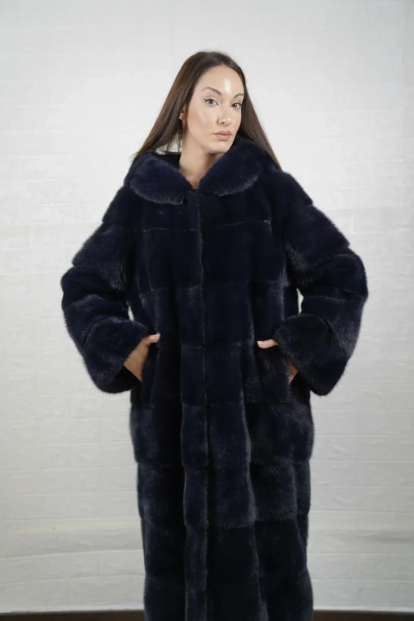 Mink fur overcoat blue women shown full length from front displaying mink lined hood and below the knee skin on skin blue overcoat silhouette — Greek craftsmanship, TatiFurs
