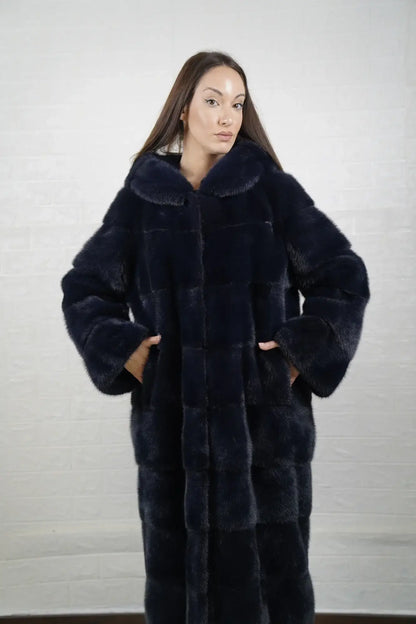 Mink fur overcoat blue women shown full length from front displaying mink lined hood and below the knee skin on skin blue overcoat silhouette — Greek craftsmanship, TatiFurs
