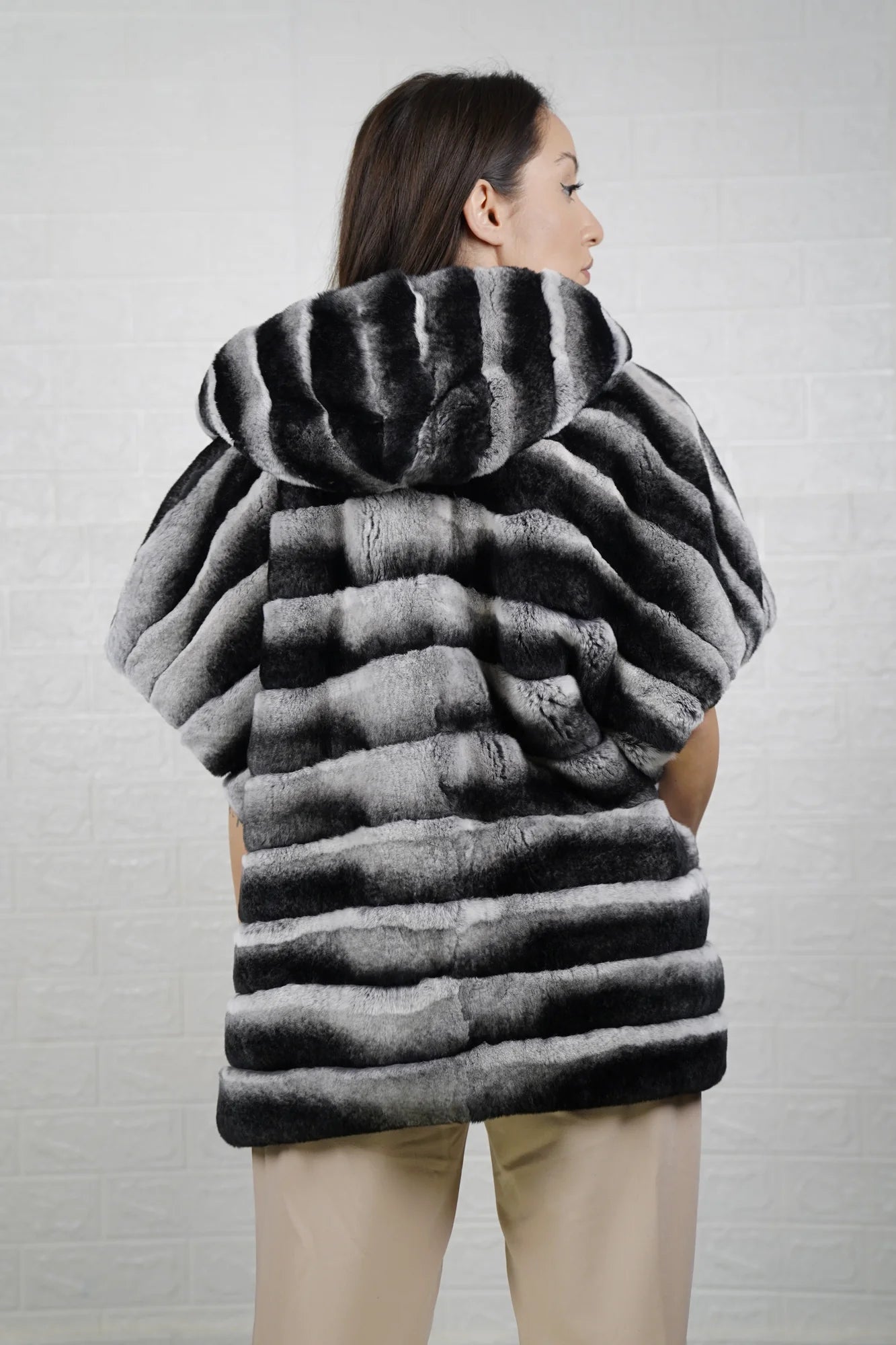 rex rabbit fur cape chinchilla — worn over charcoal roll neck, graphic pattern contrast — Greek craftsmanship, TatiFurs
