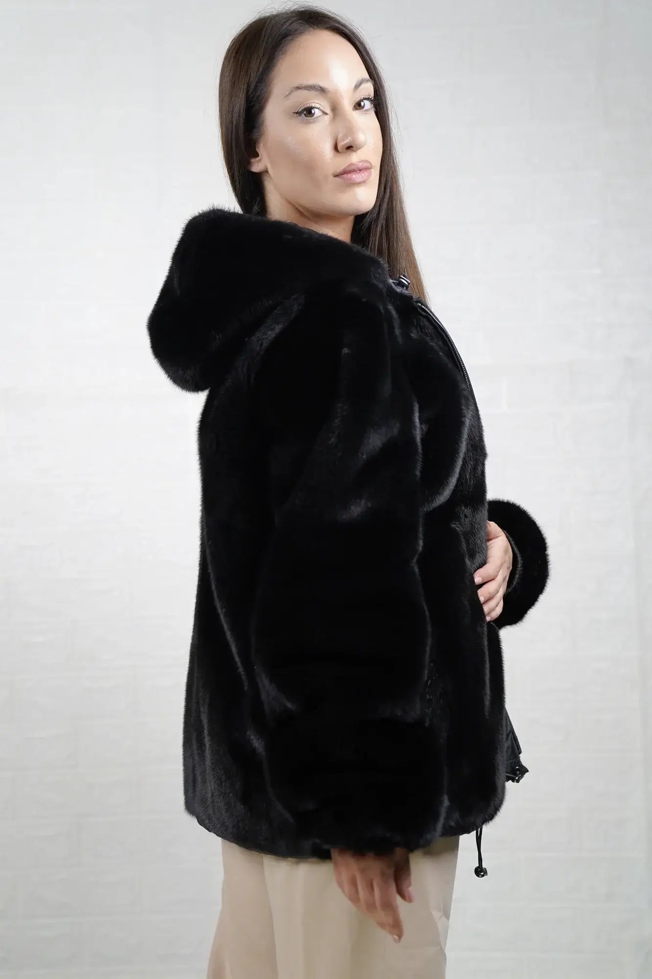 Mink fur jacket  reversible black shown from the back mink side displaying full hip level silhouette and uniform flat black mink surface — Greek craftsmanship, TatiFurs
