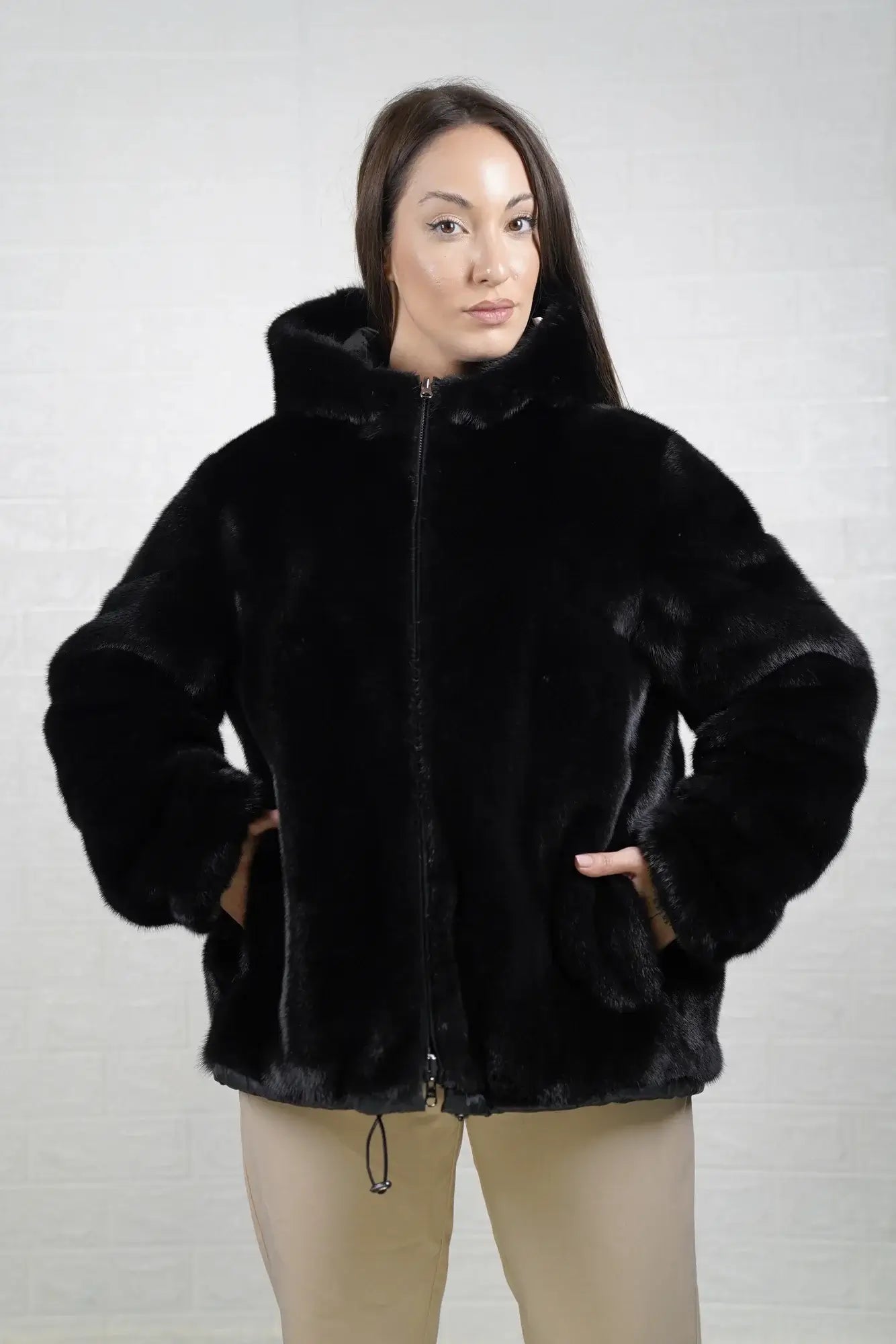 Mink fur jacket reversible black women shown full length from front mink side displaying mink lined hood and hip level silhouette — Greek craftsmanship, TatiFurs
