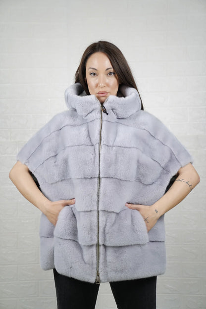 Mink fur cape purple close-up texture showing skin on skin vertical pelt flow and rich dimensional purple mink depth
